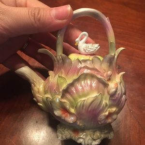Decorative miniature nonfunctional teapot